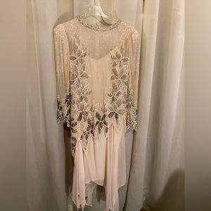 Light peach beaded dress, fully lined slipstyle, skirt with handkerchief hemline